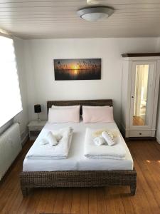 Llit o llits en una habitació de Fachwerkhaus in der Altstadt