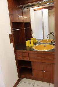 a bathroom with a sink and a mirror at LA SERRA 211 in Ivrea