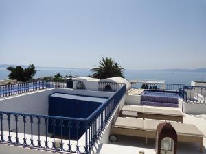 a swimming pool on the roof of a house at Dar Fatma in Sidi Bou Saïd