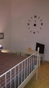 Postel nebo postele na pokoji v ubytování B&B Metropolitan Taranto