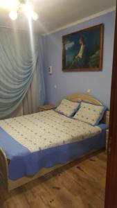Postel nebo postele na pokoji v ubytování Zatishok Guest House