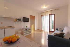 Televízia a/alebo spoločenská miestnosť v ubytovaní Apartment Valbandon, Istia 2