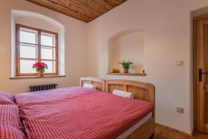 Letto o letti in una camera di Statek U Medvěda