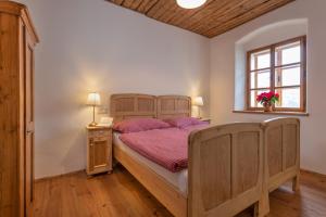 Letto o letti in una camera di Statek U Medvěda