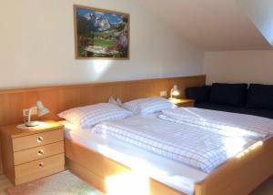 Postel nebo postele na pokoji v ubytování Oberlinderhof