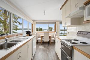 A kitchen or kitchenette at Beauty Point - Hosted by: L'Abode Accommodation