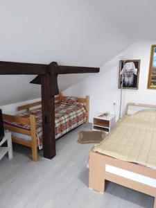 Postel nebo postele na pokoji v ubytování Apartman Vrdničak + 37 fotografií