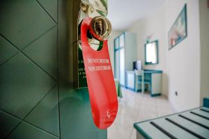 Postel nebo postele na pokoji v ubytování Hotel Sileoni