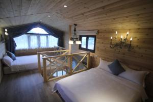 Postel nebo postele na pokoji v ubytování 心享庭園民宿 Wishes B&B