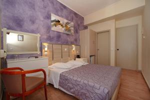 Krevet ili kreveti u jedinici u okviru objekta Socrates Hotel
