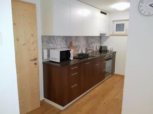 Kuchyň nebo kuchyňský kout v ubytování Haus Siegfried