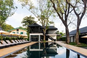 Bazén v ubytování MORA Boutique Hotel - SHA Extra Plus nebo v jeho okolí