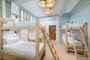 Ένα ή περισσότερα κρεβάτια σε δωμάτιο στο Ostello Bello Bagan Pool