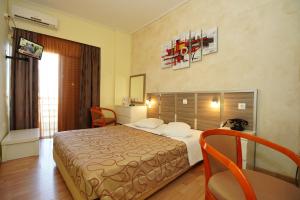 Krevet ili kreveti u jedinici u okviru objekta Socrates Hotel