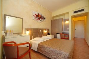 Krevet ili kreveti u jedinici u okviru objekta Socrates Hotel