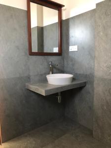 Koupelna v ubytování Dasu’s Restaurant & Villa + 16 fotografií