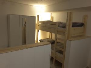 Ein Etagenbett oder Etagenbetten in einem Zimmer der Unterkunft KRIO Klaus Rothfuchs Ferienwohnung 3