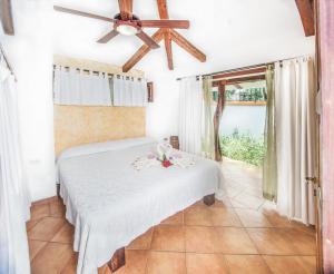 Ένα ή περισσότερα κρεβάτια σε δωμάτιο στο Villas Kalimba
