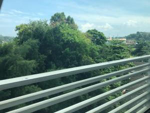 a white bridge with trees in the background at Imam Bojol Street No 1 kampung utama Batam in Nagoya