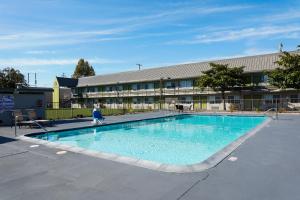 The swimming pool at or near SureStay Plus Hotel by Best Western Point Richmond