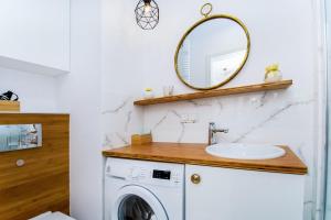Kúpeľňa v ubytovaní erApartments Mennica Residence + 37 fotografií