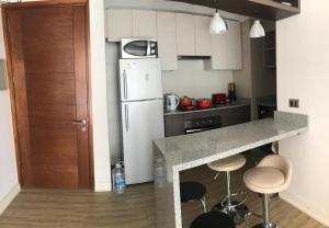 Una cocina o zona de cocina en Departamento perfecta ubicación Viña del Mar