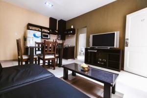 Μια τηλεόραση ή/και κέντρο ψυχαγωγίας στο Apartamentos Boulevard I