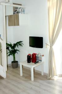 TV/trung tâm giải trí tại San Luigi Milano Apartment