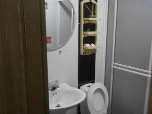 Koupelna v ubytování Hotel Ibague Plaza