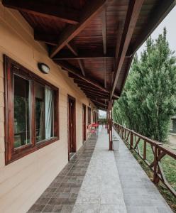 a covered walkway on the side of a house at Patagonia Suites in El Calafate