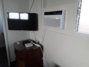 TV a/nebo společenská místnost v ubytování Tip Top Motel
