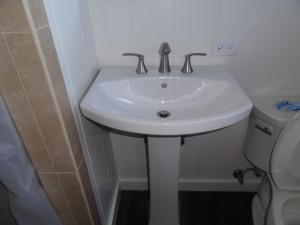 Koupelna v ubytování Tip Top Motel