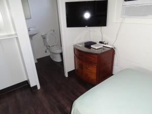Koupelna v ubytování Tip Top Motel