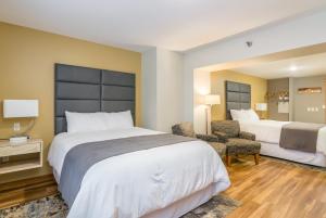 Postel nebo postele na pokoji v ubytování Grey Fox Inn