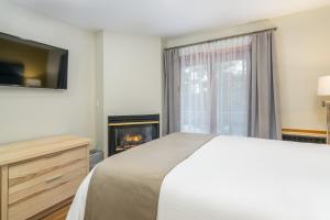 Postel nebo postele na pokoji v ubytování Grey Fox Inn