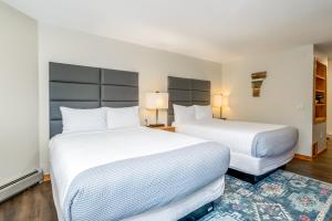 Postel nebo postele na pokoji v ubytování Grey Fox Inn