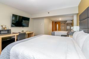 Postel nebo postele na pokoji v ubytování Grey Fox Inn
