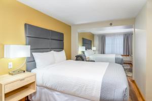 Postel nebo postele na pokoji v ubytování Grey Fox Inn