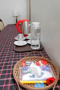a table with a wicker basket on a table at KC Beachfront in Marang