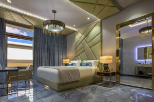 Postel nebo postele na pokoji v ubytování O:LV Fifty Five Hotel - Adults Only