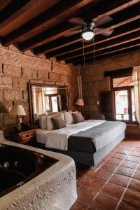 Säng eller sängar i ett rum på Hotel Sol y Fiesta
