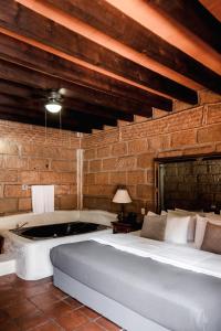 Postel nebo postele na pokoji v ubytování Hotel Sol y Fiesta