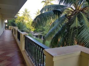 A balcony or terrace at Areia De Goa, Comfort Stay Apartment near Baga Beach
