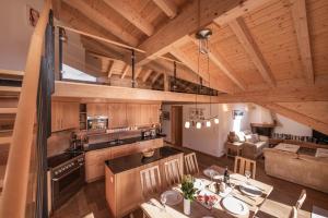 Kuchyň nebo kuchyňský kout v ubytování Chalet Aquila 8 Penthouse