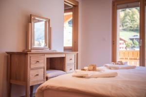 Postel nebo postele na pokoji v ubytování Chalet Aquila 8 Penthouse