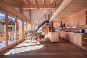 Kuchyň nebo kuchyňský kout v ubytování Chalet Aquila 8 Penthouse