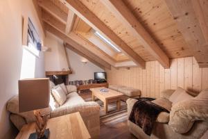 TV a/nebo společenská místnost v ubytování Chalet Aquila 8 Penthouse