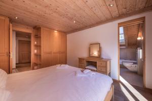 Postel nebo postele na pokoji v ubytování Chalet Aquila 8 Penthouse