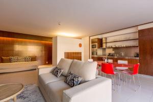 a living room with a couch and a table at Apartments Maria - Salgados 10A0D in Albufeira