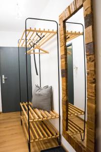 a mirror in a dressing room with a black frame at Am Wasserfall 31 in Bad Gastein
